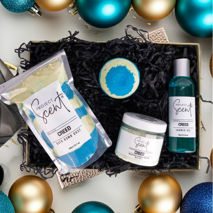Project Scent products with Christmas ornaments on a white background