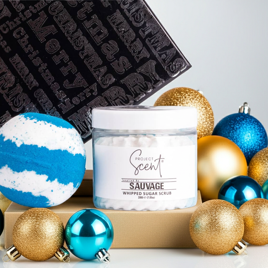 Whipped Sugar Scrub 'Project Scent' branding surrounded by decorative ornaments on a reflective surface.