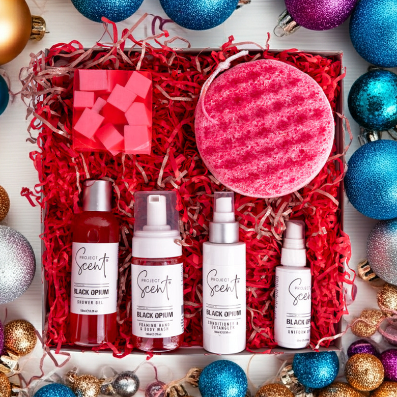 Project Scent Shower products in a gift box with Christmas decorations