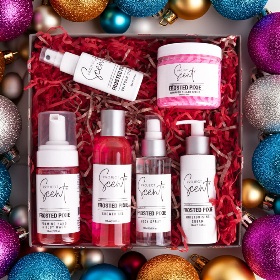 Flat lay of Project Scent Shower ift Set with Christmas decorations as the surroundings.