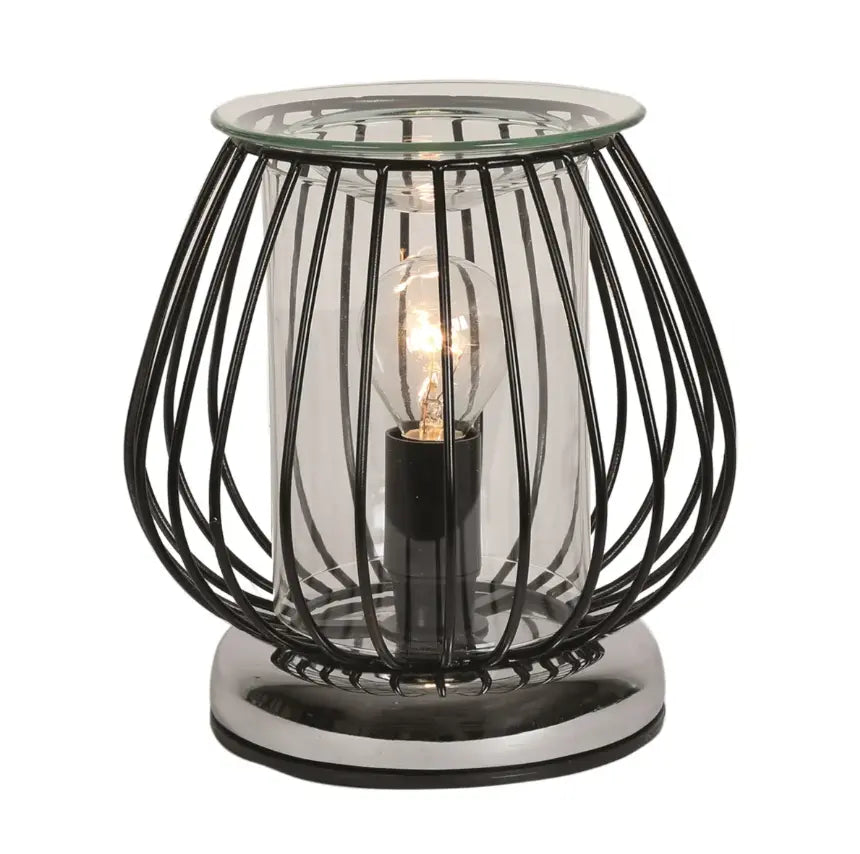Industrial look electric wax melt burner with black metal frame and chrome base