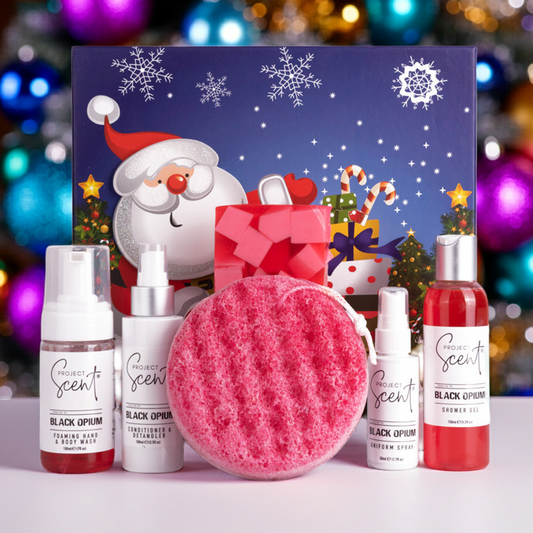Project Scent products in Black Opium with a Christmas background.