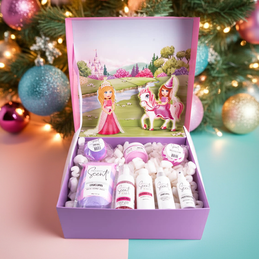 Bath & Body Kids Gift set with princess-themed packaging in front of a decorated Christmas tree