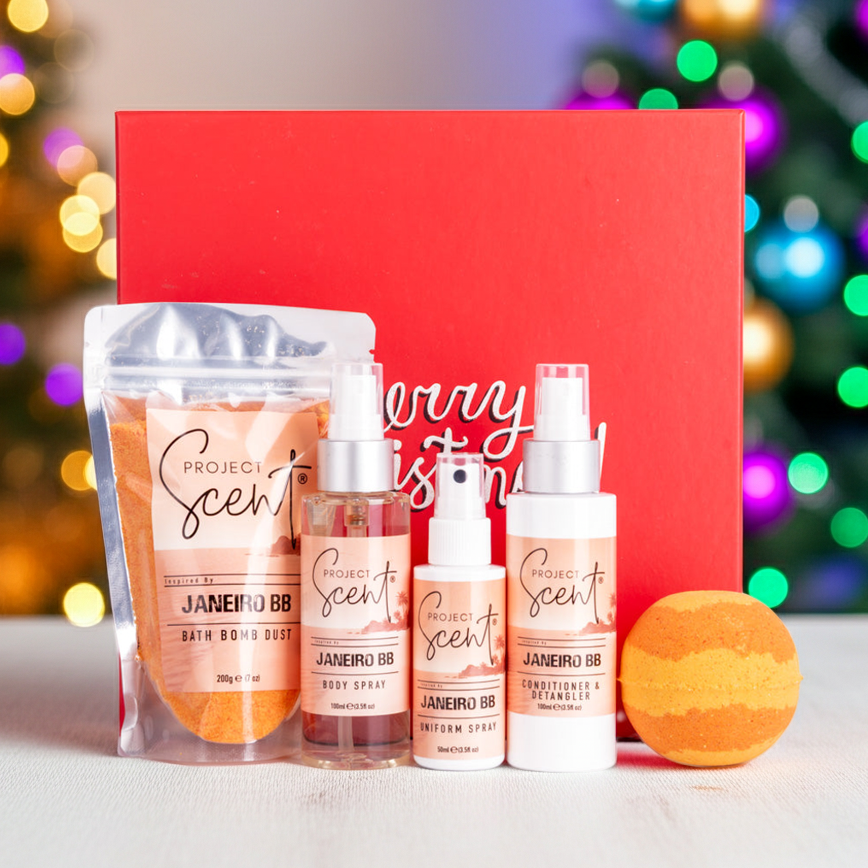 Collection of Project Scent products with a red box and Christmas lights in the background
