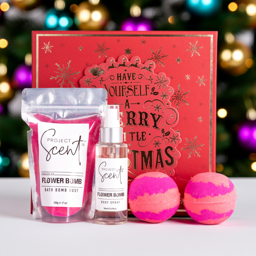 Flower Bomb Products in front of a christmas background