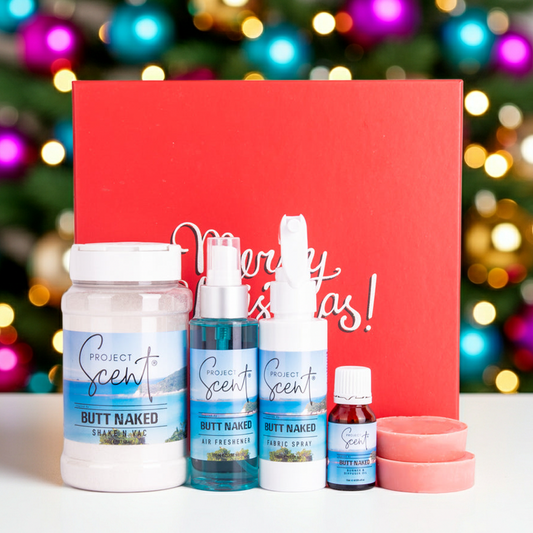 Project Scent products with a red box and Christmas tree in the background