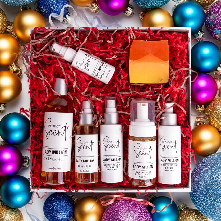 Gift set with Project Scents products surrounded by colorful ornaments