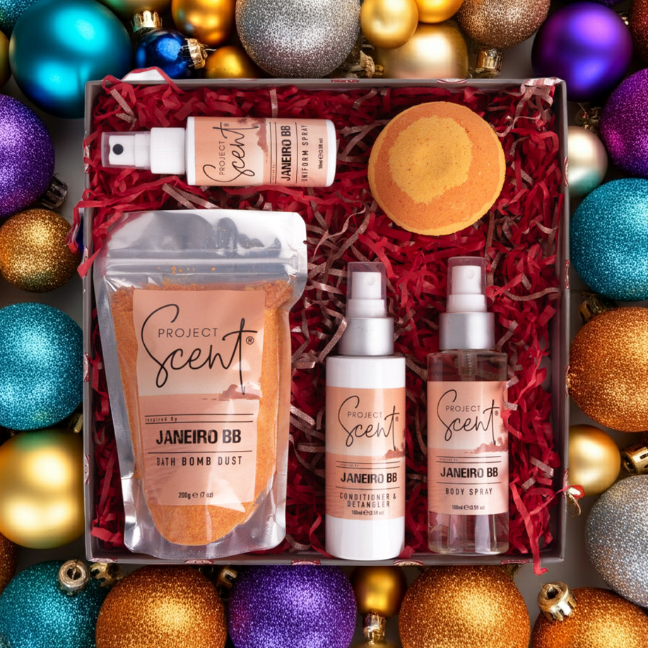 Project Scent beauty products in a decorative box surrounded by colorful ornaments